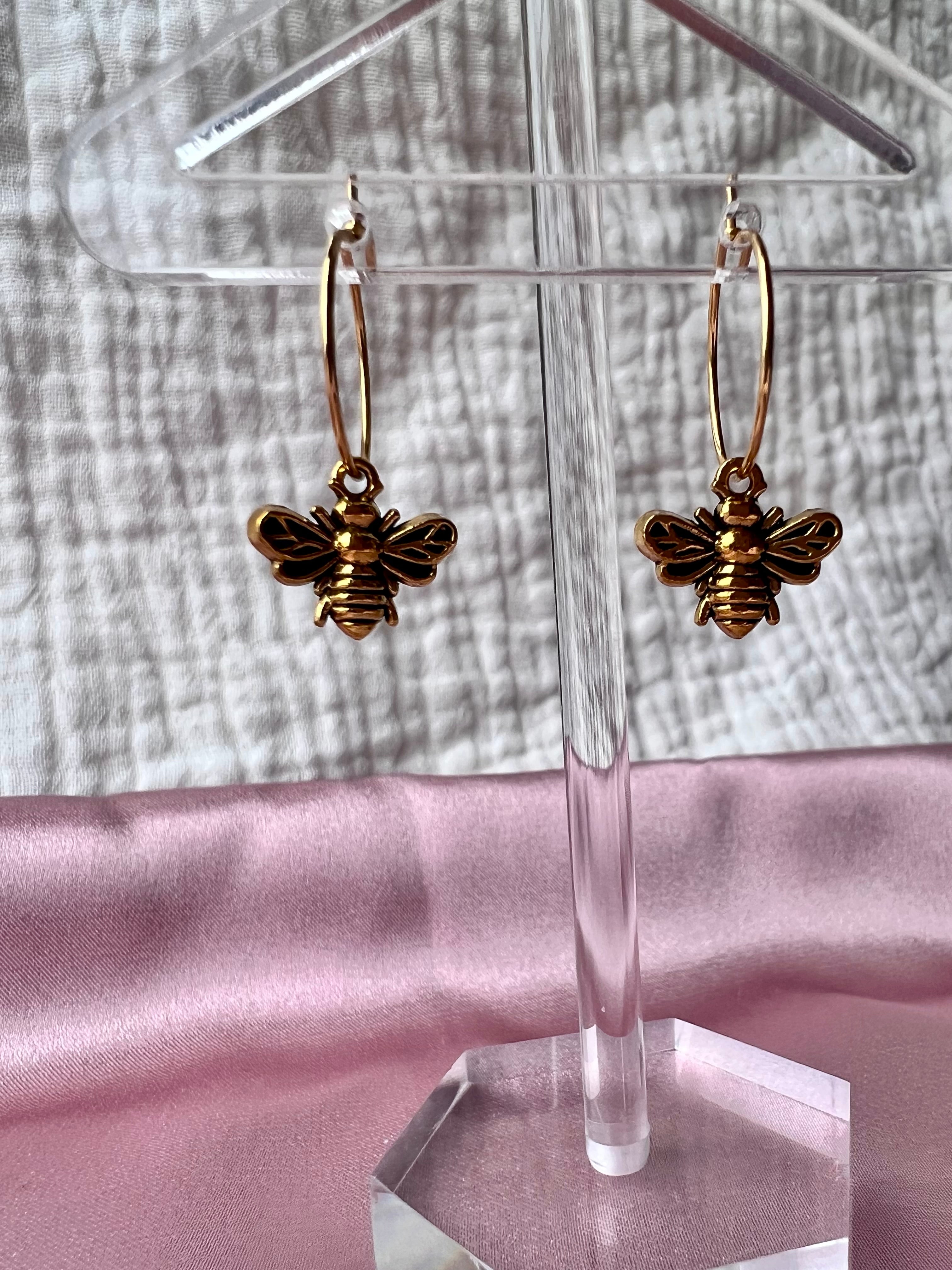 Tiny gold bee on sale earrings